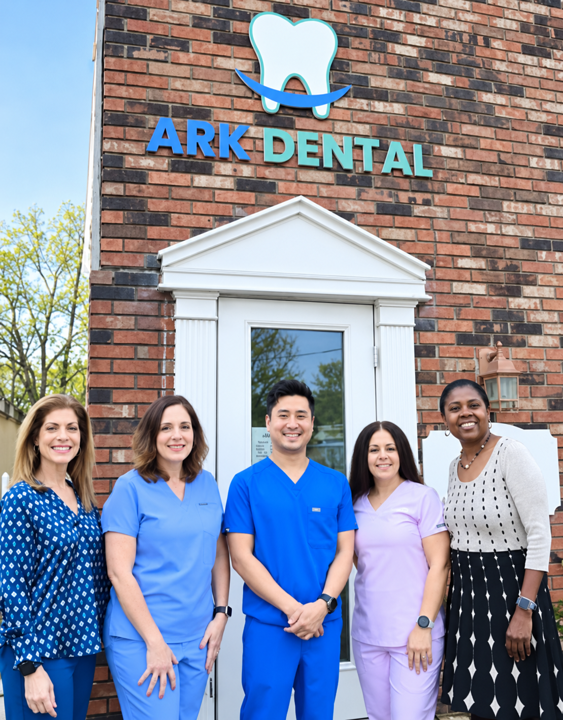 Dr. Seung Yub Song and the Ark Dental team outside their Norwalk office