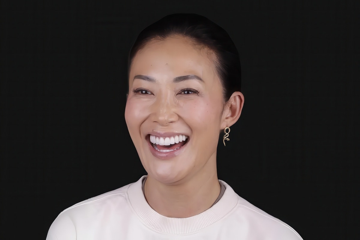 Patient showing a porcelain veneer smile at Oh Aesthetic Dentistry